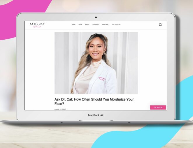 A laptop featuring an image of cosmetic surgeon Dr. Cat and her skincare blog, MD Glam, with content featured and written by the beauty writers at Lyon Content.