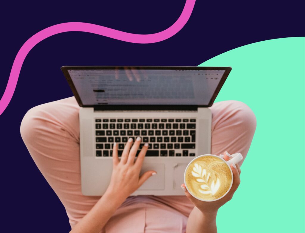 woman holding coffee typing on a laptop in front of colorful background in Lyon Content's blog writing costs breakdown