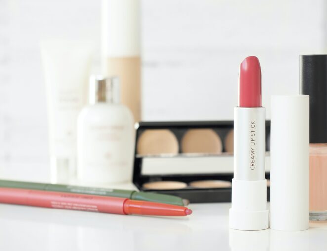 Beauty Blog post image featuring makeup on a counter.