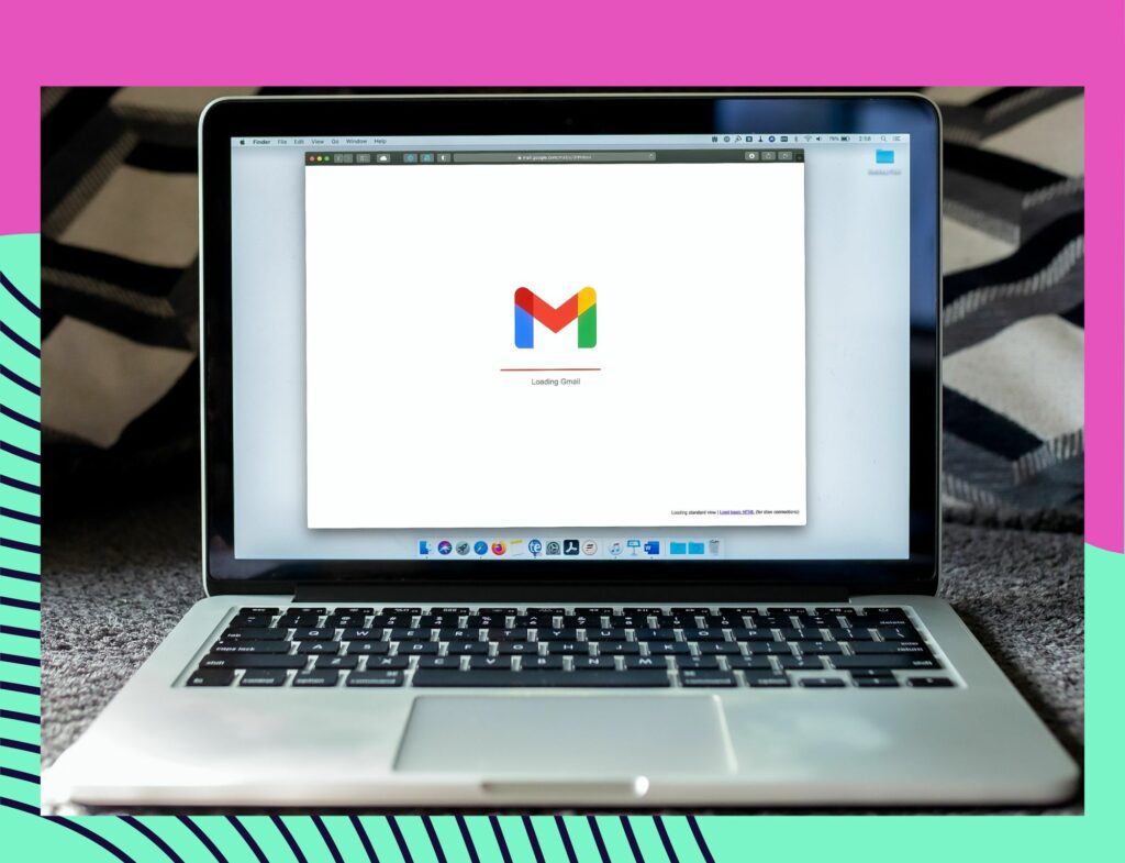 laptop open to gmail page in front of bright background for post about how to create newsletters