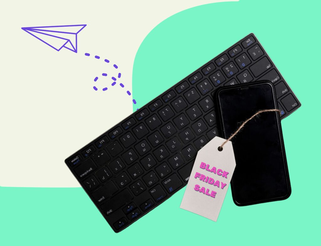paper plane coming from keyword and cell phone with tag saying black friday sale