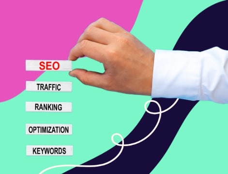hand holding bars that say seo traffic ranking optimization and keywords in post about keyword difficulty