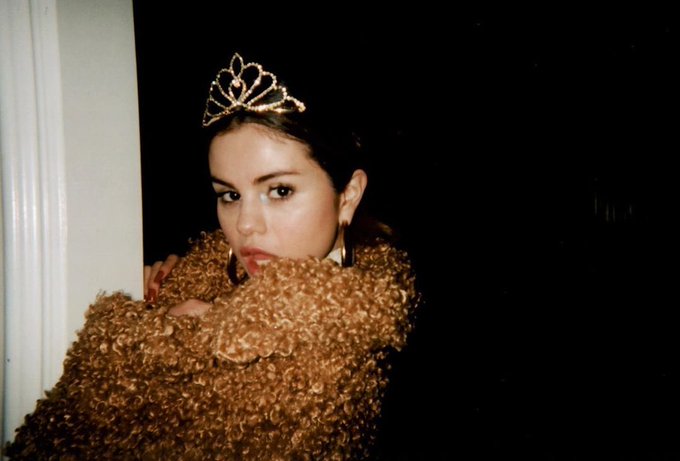Selena Gomez wearing a crown