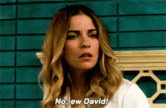 Gif of Alexis from Schitts Creek saying no ew david