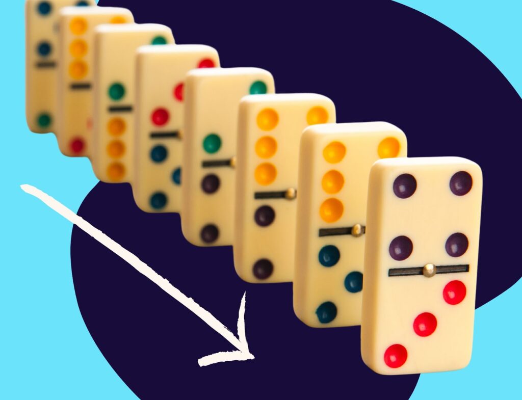 Colored dominos lined up to fall next to arrow pointing the direction of the sequence, in front of abstract blue background